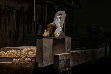 Jack plane on carpenter's table with chips scattered aroundの写真素材