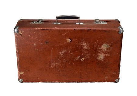Old leather brown vintage travel suitcase isolated on white background. Symbol and concept of travel. Adventure time.の写真素材