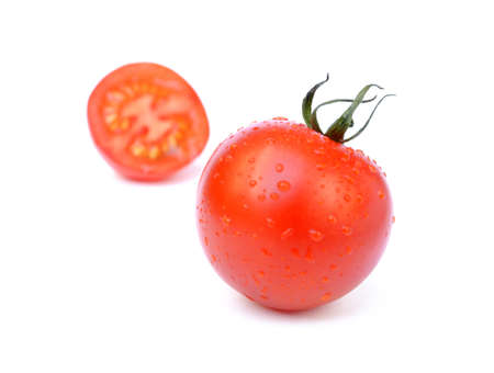 Fresh tomato isolated on white backgroundの写真素材