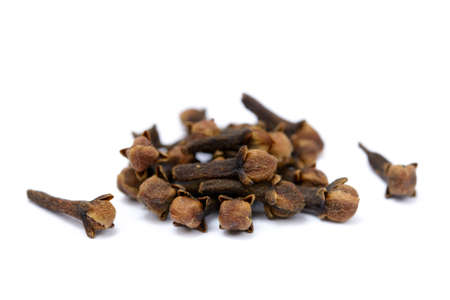 Fragrant spices cloves isolated on white backgroundの写真素材
