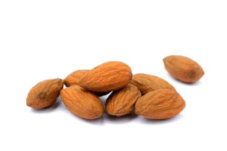 Group of fresh almonds isolated on white backgroundの写真素材