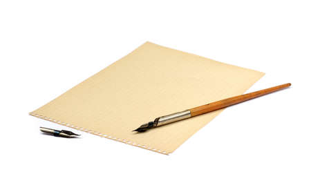 Old ink pen and paper isolated on white backgroundの写真素材