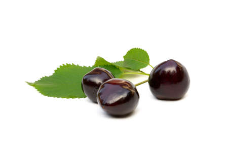 Sweet ripe cherries isolated on white backgroundの写真素材