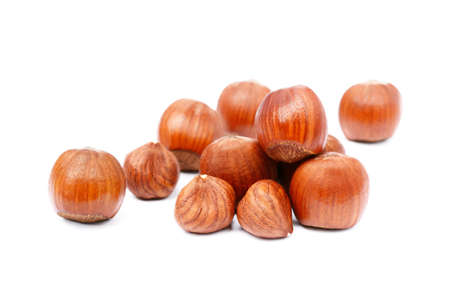 Group healty hazelnuts isolated on white backgroundの写真素材