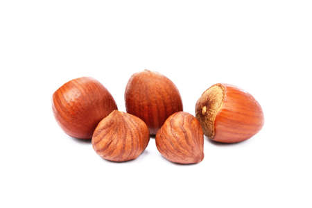Group healty hazelnuts isolated on white backgroundの写真素材