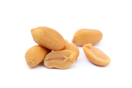Arranged peanuts peeled and isolated on white backgroundの写真素材