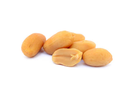 Arranged peanuts peeled and isolated on white backgroundの写真素材