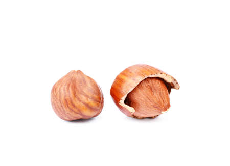 Group healty hazelnuts isolated on white background