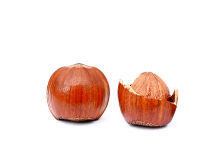 Group healty hazelnuts isolated on white background