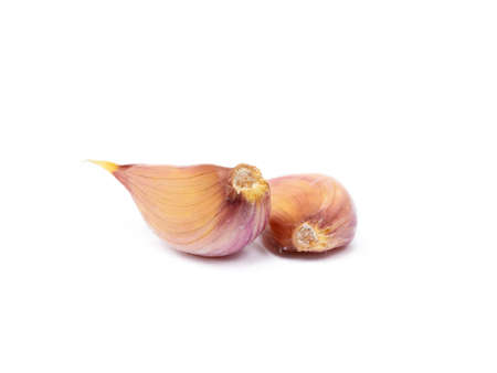 Fresh garlic cloves isolated on white backgroundの写真素材