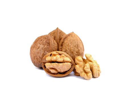 Walnuts in shell isolated on white backgroundの写真素材
