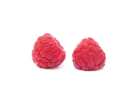 Sweet ripe raspberries isolated on white backgroundの写真素材