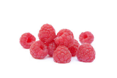 Sweet ripe raspberries isolated on white backgroundの写真素材