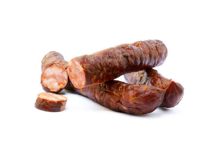 Tasty high quality smoked sausage isolated on white backgroundの写真素材