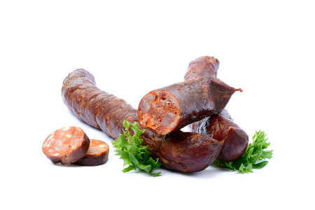Delicious high quality smoked sausage on a crumpled paperの写真素材
