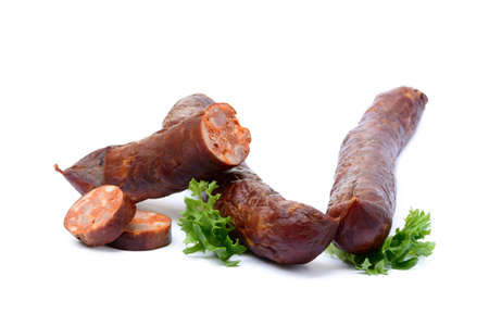 Delicious high quality smoked sausage on a crumpled paperの写真素材