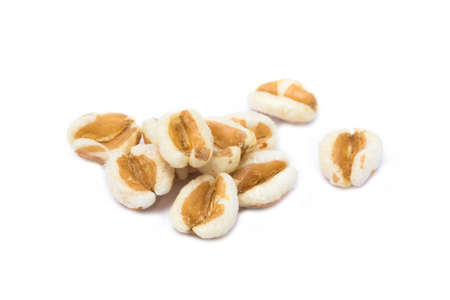 Healthy spelled popcorn isolated on white backgroundの写真素材