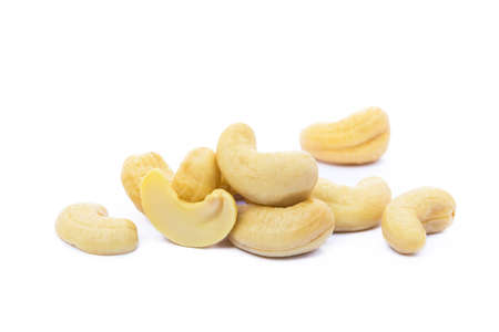 Roasted salted cashews isolated on a white backgroundの写真素材