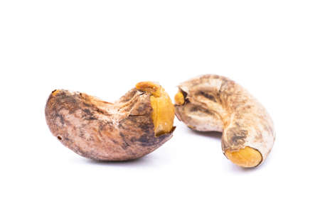 Roasted cashew nuts isolated on white backgroundの写真素材