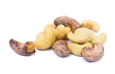 Roasted cashew nuts isolated on white backgroundの写真素材