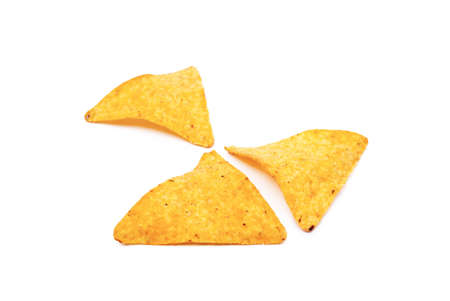 Corn chips, triangle, nachos isolated on white backgroundの写真素材