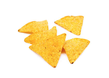 Corn chips, triangle, nachos isolated on white backgroundの写真素材