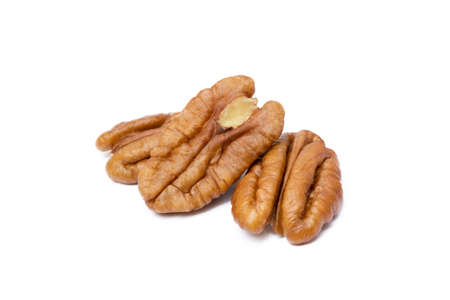 Fresh pecan nuts isolated on white backgroundの写真素材