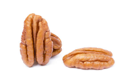 Fresh pecan nuts isolated on white backgroundの写真素材