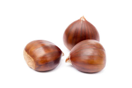 Chestnuts isolated on white backgroundの写真素材