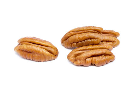 Fresh pecan nuts isolated on white backgroundの写真素材