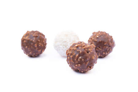 Chocolate ball candy isolated on white backgroundの写真素材