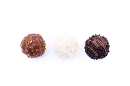 Chocolate ball candy isolated on white backgroundの写真素材