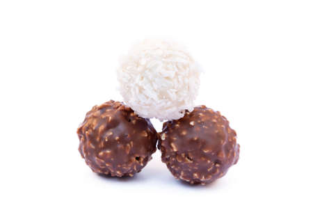 Chocolate ball candy isolated on white backgroundの写真素材