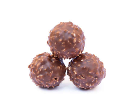 Chocolate ball candy isolated on white backgroundの写真素材