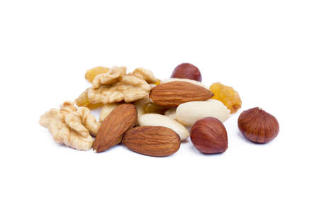 Mixed fresh nuts and raisins isolated on white backgroundの写真素材