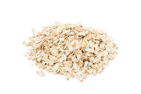 Pile of healthy oatmeal isolated on white backgroundの写真素材