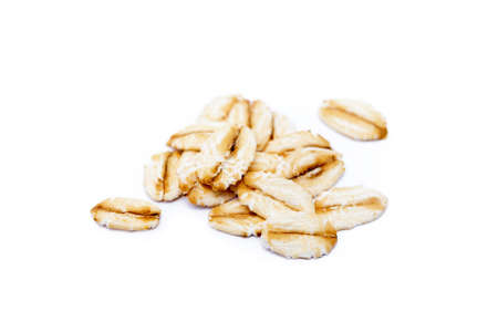 Pile of healthy oatmeal isolated on white backgroundの写真素材