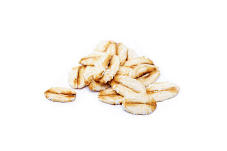 Pile of healthy oatmeal isolated on white backgroundの写真素材