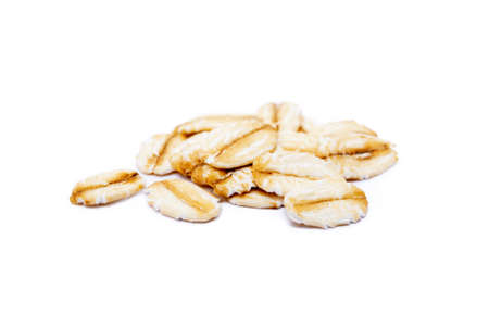 Pile of healthy oatmeal isolated on white backgroundの写真素材