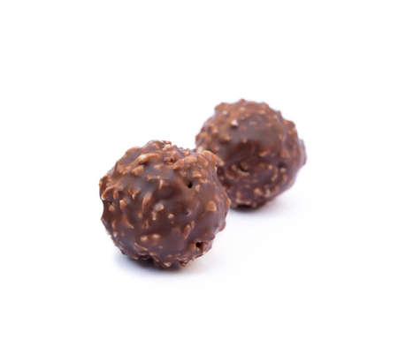 Chocolate ball candy isolated on white backgroundの写真素材
