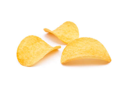 Salted potato chips isolated on white backgroundの写真素材