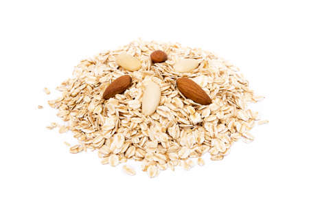 Mix nuts, almond and oatmeal isolated on white backgroundの写真素材