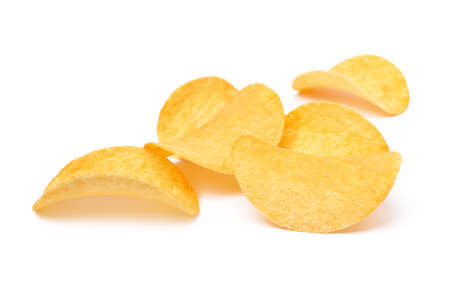 Salted potato chips isolated on white backgroundの写真素材