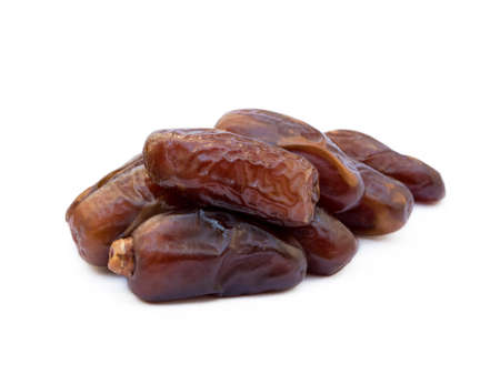 Dried sweet dates isolated on white backgroundの写真素材