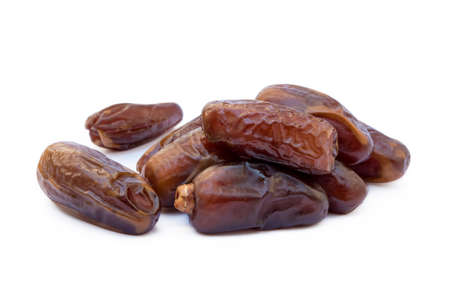 Dried sweet dates isolated on white backgroundの写真素材