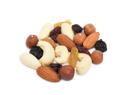 Mixed fresh nuts and raisins isolated on white backgroundの写真素材