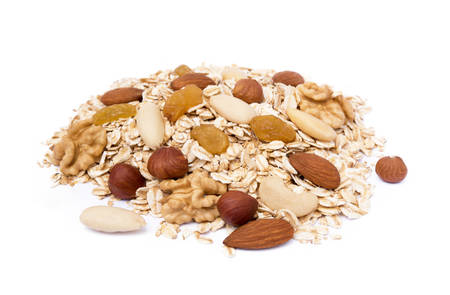 Mixed fresh nuts isolated on white backgroundの写真素材