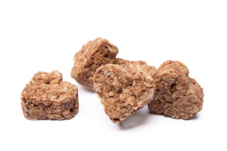 Oatmeal heart dessert isolated on white backgroundの写真素材