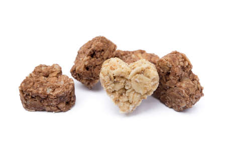 Oatmeal heart dessert isolated on white backgroundの写真素材