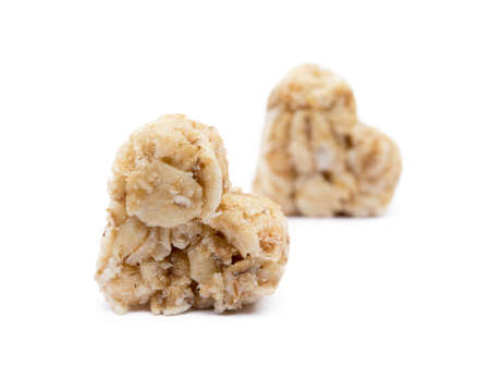 Oatmeal heart dessert isolated on white backgroundの写真素材